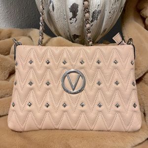 Mario Valentino pale rose leather bag with silver studs. Never been used.